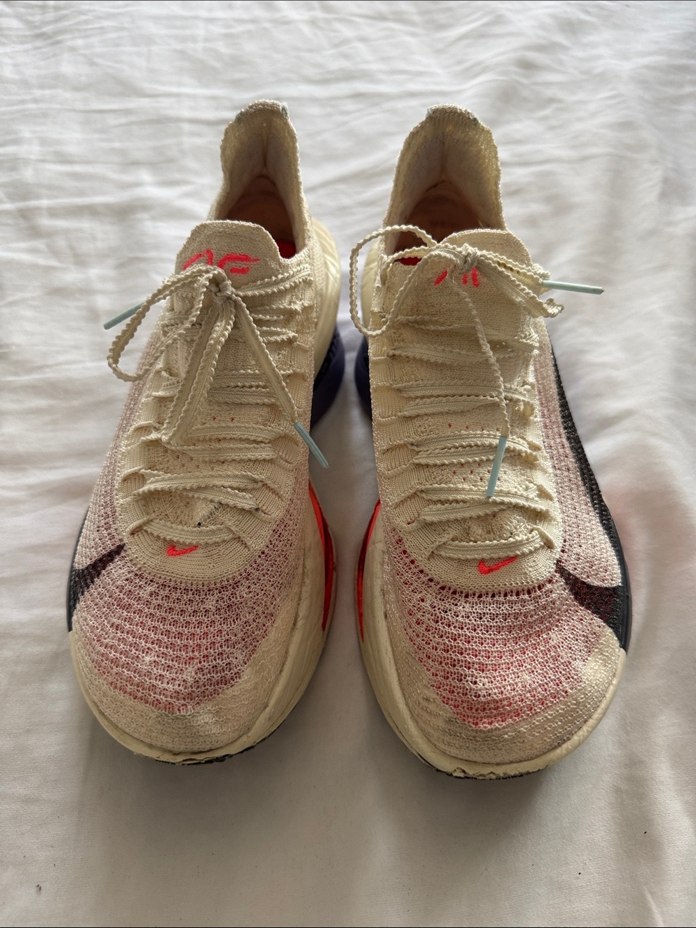 Nike Women’s Cream ZoomX Running Shoes with Pink and Black Accents